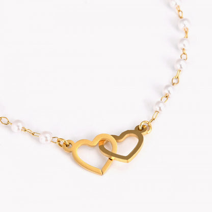 Steel bracelet with pearls and hearts 