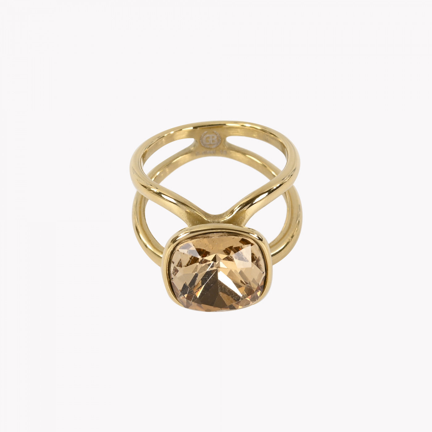 anel de aço com pedra caramelo cushion em acabamento dourado com aro duplo cruzado da Carmo Joalheiros