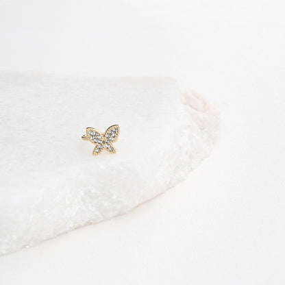 Brinco ear cuff borboleta aço dourado com zircónias brilhantes da Carmo Joalheiros em fundo branco
