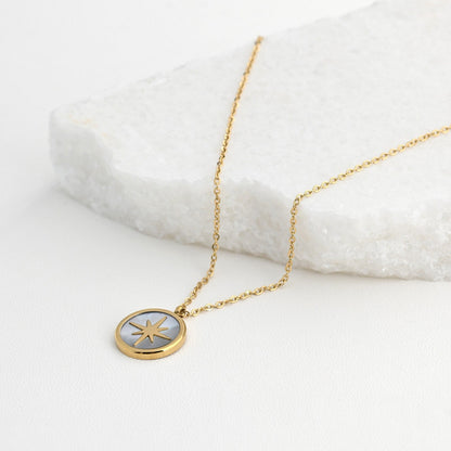 Steel necklace with mother of pearl and a star. 