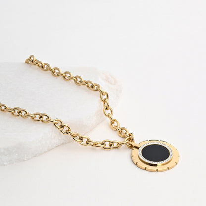 Round steel necklace with mother of pearl