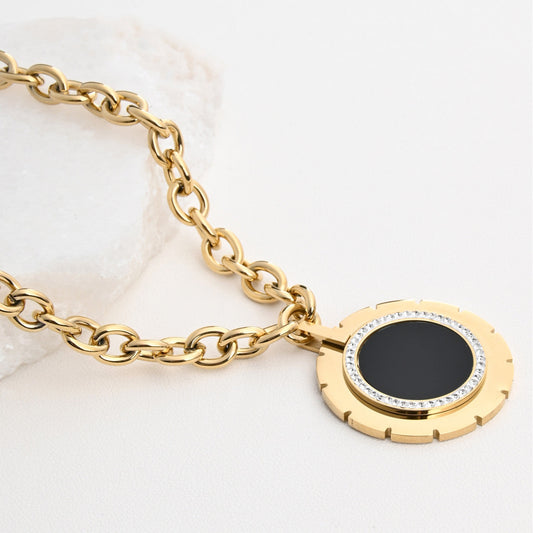 Round steel necklace with mother of pearl