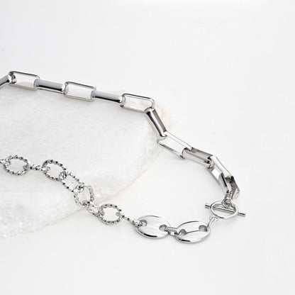 Reversible steel necklace with links